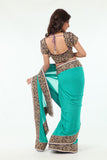 Enchanting Beauty Mint Colored Sari with Rich Blue Border