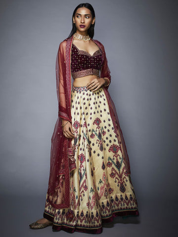 Image Title RI-Ritu-Kumar-Off-White-And-Prune-Ikat-Lehenga-Set-Side-View1