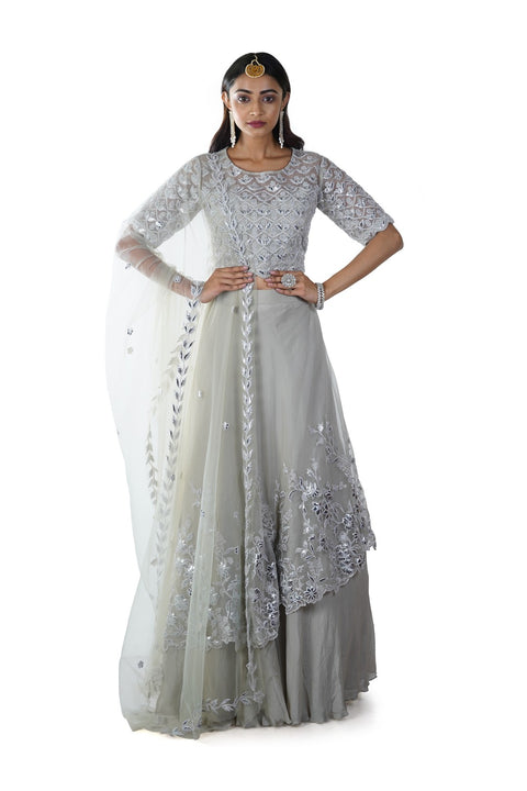 Light Green Floral Rexin Embroidered Blouse with an Asymmetrically Layered Lehenga paired with a Dupatta