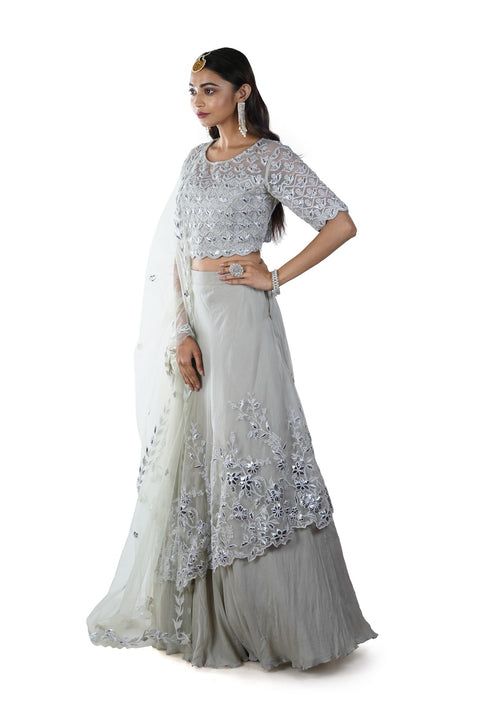 Light Green Floral Rexin Embroidered Blouse with an Asymmetrically Layered Lehenga paired with a Dupatta
