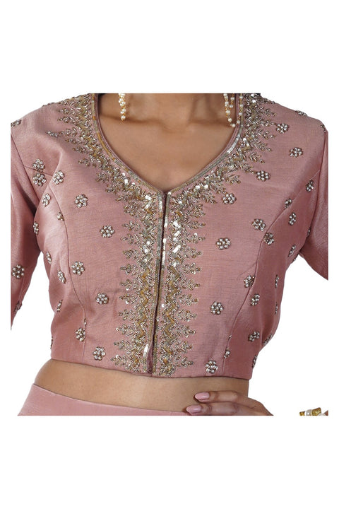 Rose Gold Pearls & Sequins Hand Embroidered Blouse paired with a 5 Layer Ruffle Lehenga & Pleated Dupatta