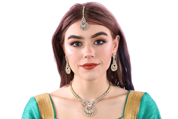 Simplistically Stunning Light Gold Necklace Set with Earrings and Tika