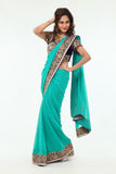 Enchanting Beauty Mint Colored Sari with Rich Blue Border