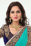 Enchanting Beauty Mint Colored Sari with Rich Blue Border