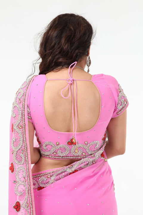 Blushing Beauty in Pink Sari with Silver Beaded Border