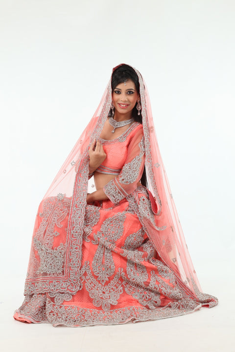 Sensational & Glamorous Diamond Studded Coral Lehenga Choli - SNT11137