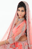 Sensational & Glamorous Diamond Studded Coral Lehenga Choli - SNT11137