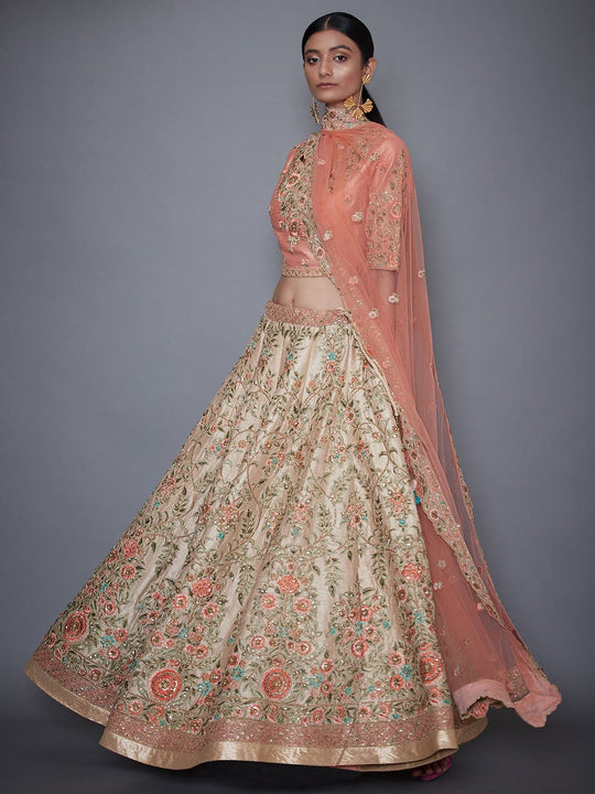 RI-Ritu-Kumar-Ivory-And-Pink-Embroidered-Lehenga-Set-Side-View1