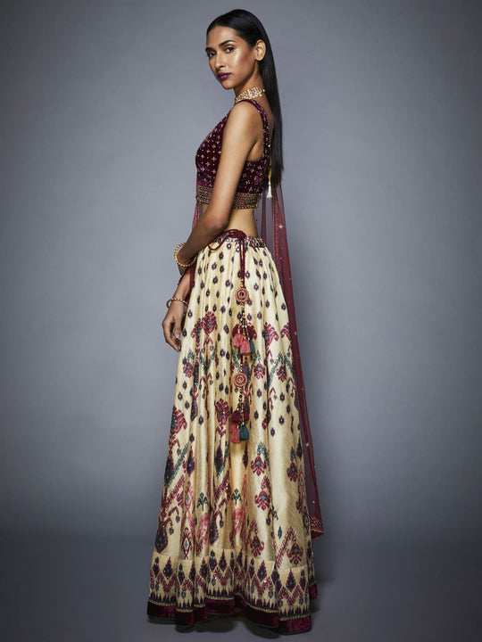 RI-Ritu-Kumar-Off-White-And-Prune-Ikat-Lehenga-Set-Side-View2