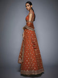 RI-Ritu-Kumar-Rust-And-Gold-Bridal-Lehenga-Set-Side-View1