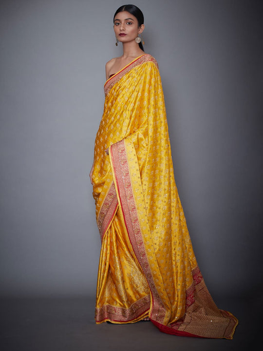 RI-Ritu-Kumar-Yellow-And-Red-Embroidered-Saree-With-Unstitched-Blouse-Side-View1