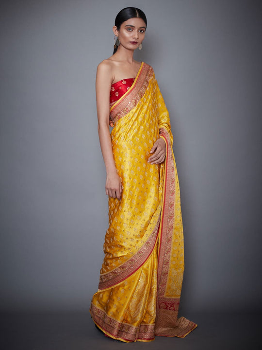 RI-Ritu-Kumar-Yellow-And-Red-Embroidered-Saree-With-Unstitched-Blouse-Side-View2