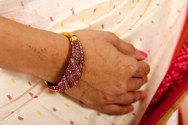 Richness Redefined in Beige and Pink Saree