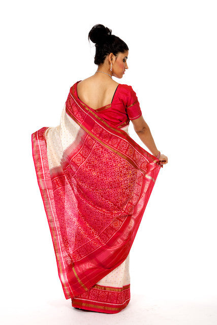 Richness Redefined in Beige and Pink Saree