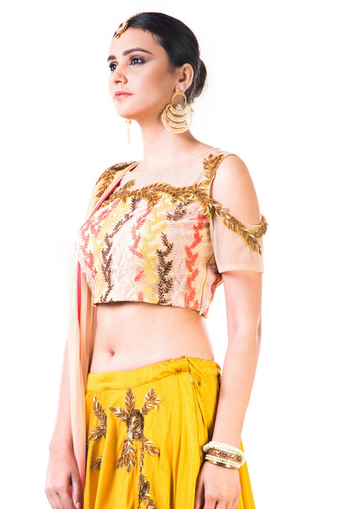 Mustard Yellow Lehenga With An Embroidered Beige Blouse And Shaded Dupatta