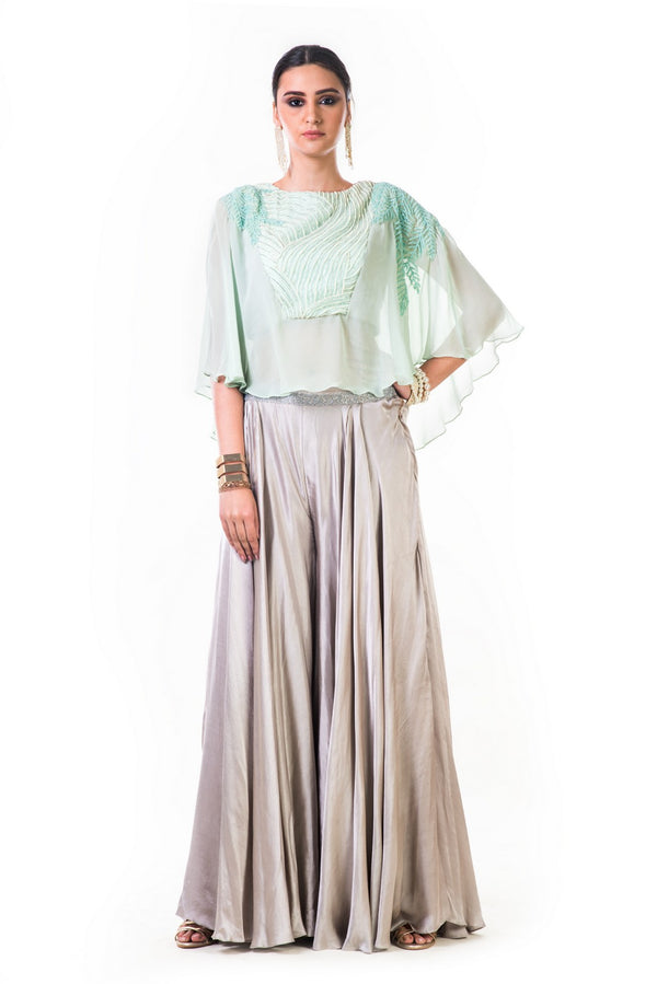 Aqua Green Cape Blouse With Hand Embroidered Silver Cutdana And Moti Work With Grey Palazzo Pants