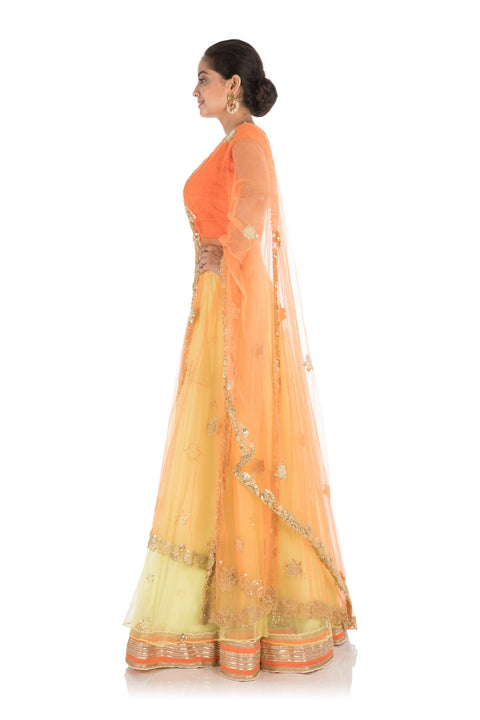 Hand Embroidered Bright Yellow And Orange Net Lehenga Set