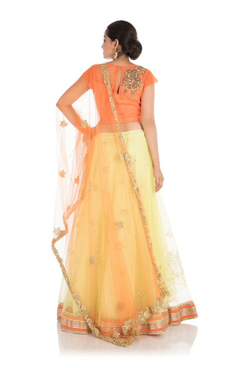 Hand Embroidered Bright Yellow And Orange Net Lehenga Set
