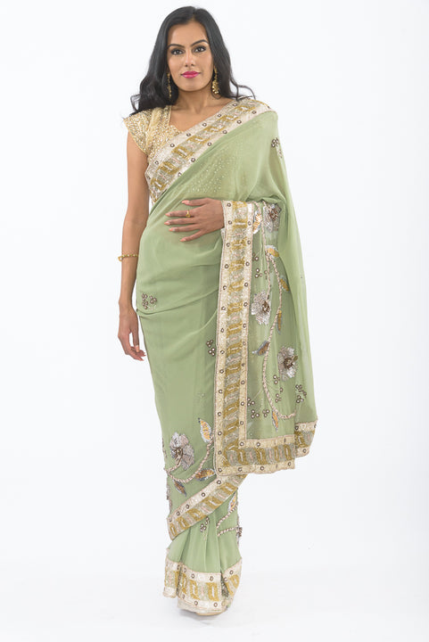 Glamorous Green Heavy Embroidered Indian Wedding Reception Sari