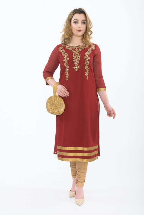 Maroon long kurti with gold leggings -Front
